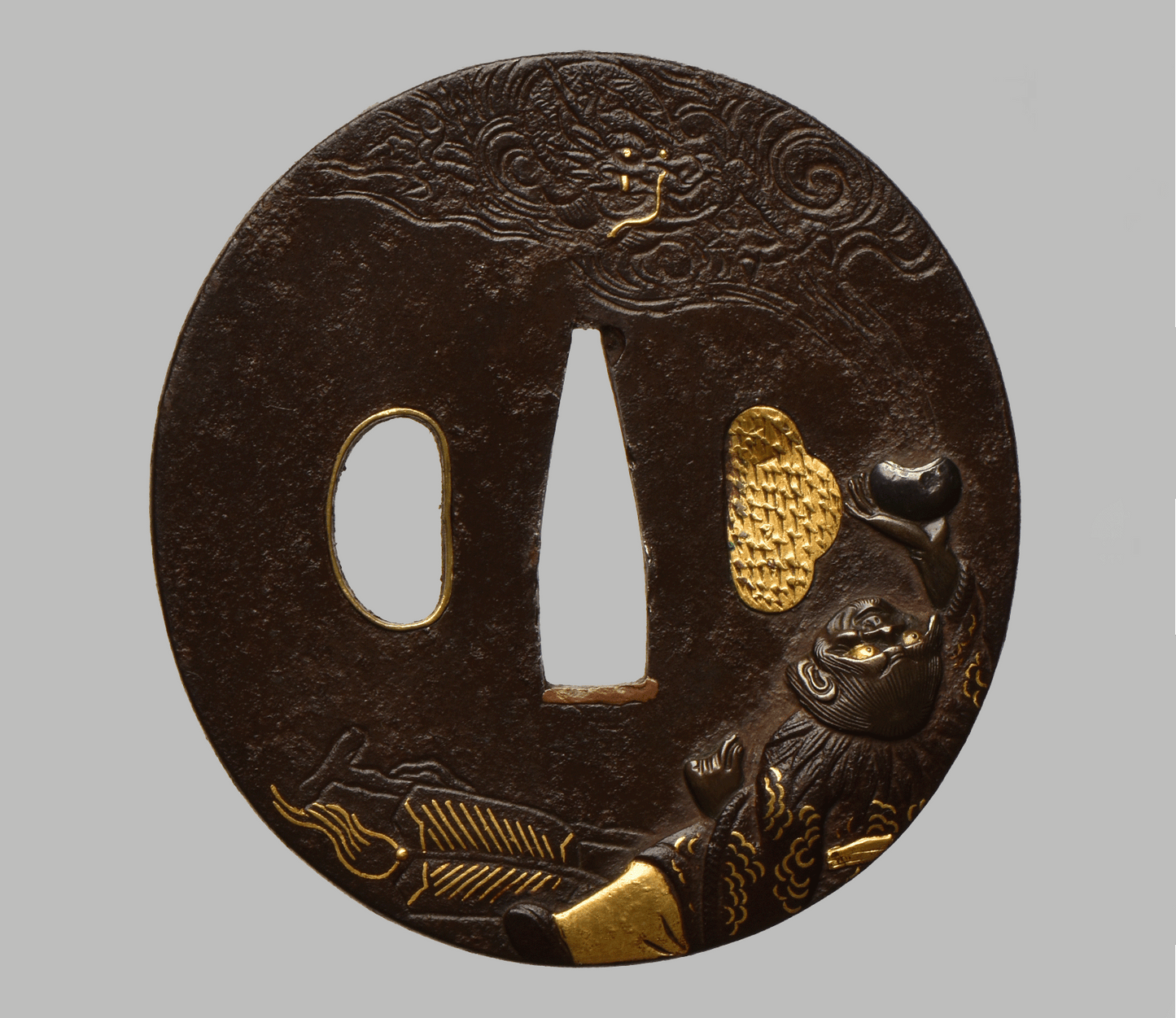 Tsuba - Mito - (馬師皇) - Hotei with dragon - shakudo, gold and silver