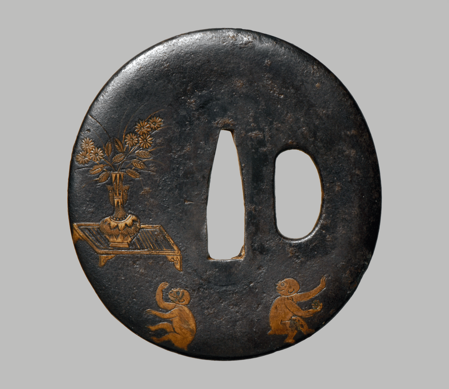 - Tsuba - Yamashiro no Kuni‐jū Nagayoshi saku” (山城国住長吉作).
