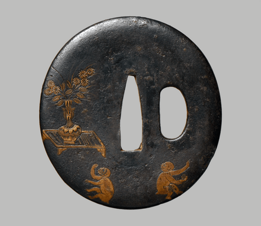 - Tsuba - Yamashiro no Kuni‐jū Nagayoshi saku” (山城国住長吉作).